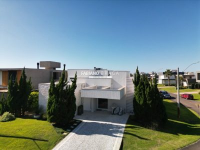 Sobrado com 327m², 5 dormitórios, 5 suítes, 4 vagas, Enseada Lagos em Xangri-lá