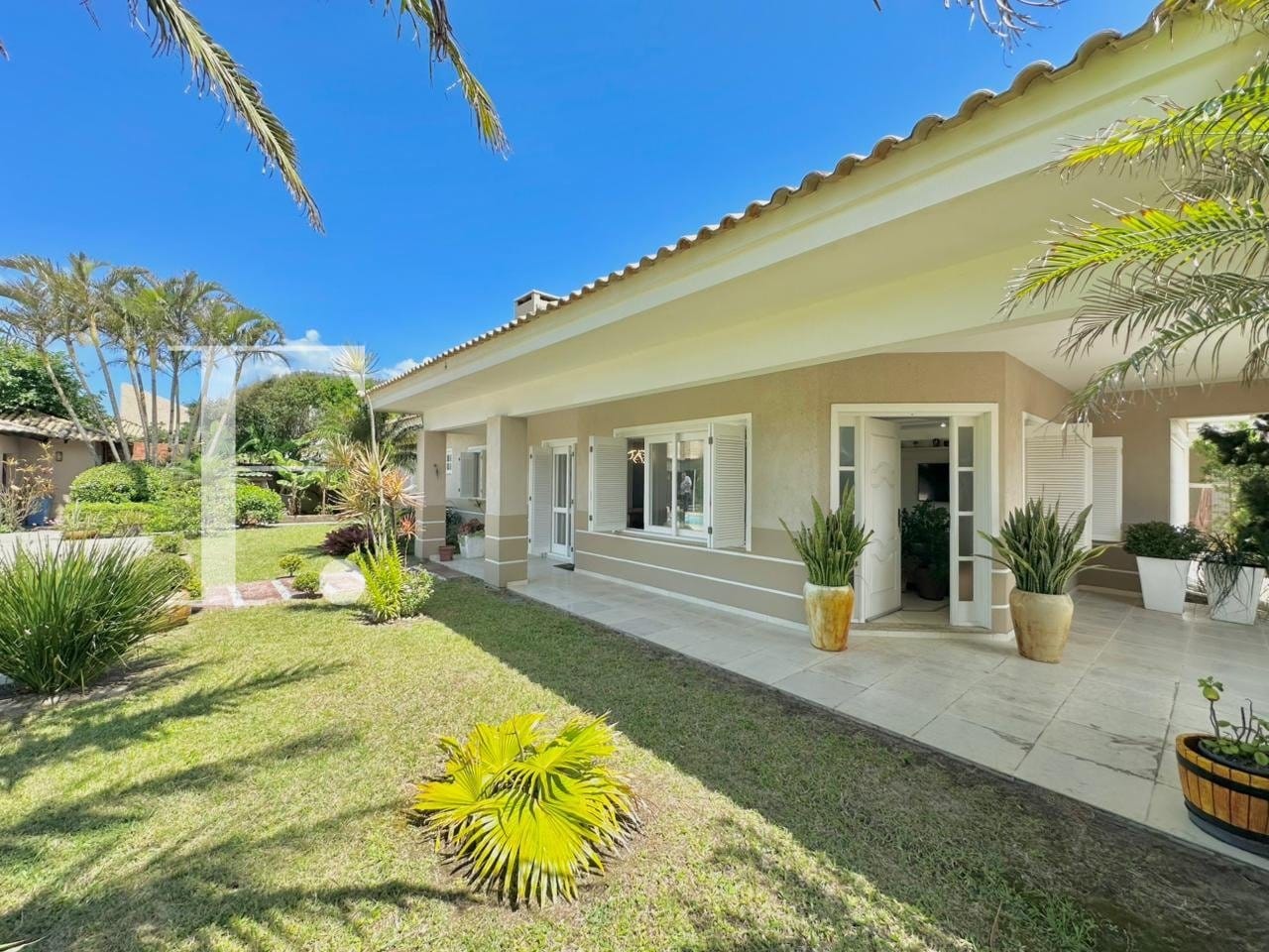 Casa com 187m², 4 dormitórios, 2 suítes, 4 vagas, no bairro Atlântida em Xangri-Lá