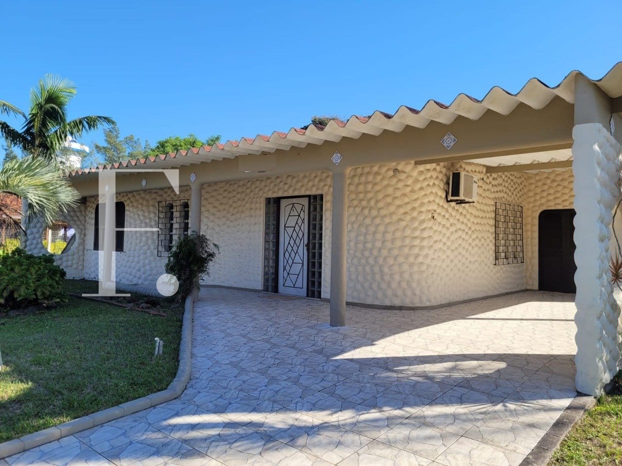 Casa com 140m², 3 dormitórios, 1 suíte, 2 vagas, no bairro Atlântida em Xangri-Lá