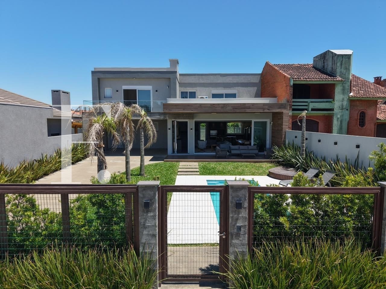 Casa com 243m², 4 dormitórios, 4 suítes, 2 vagas, no bairro Remanso em Xangri-Lá