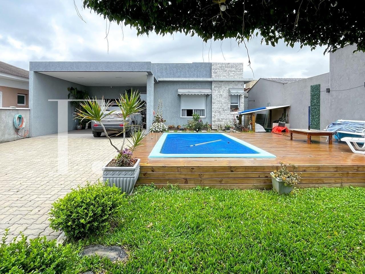 Casa com 110m², 2 dormitórios, 2 suítes, 4 vagas, no bairro Rainha do Mar em Xangri-Lá