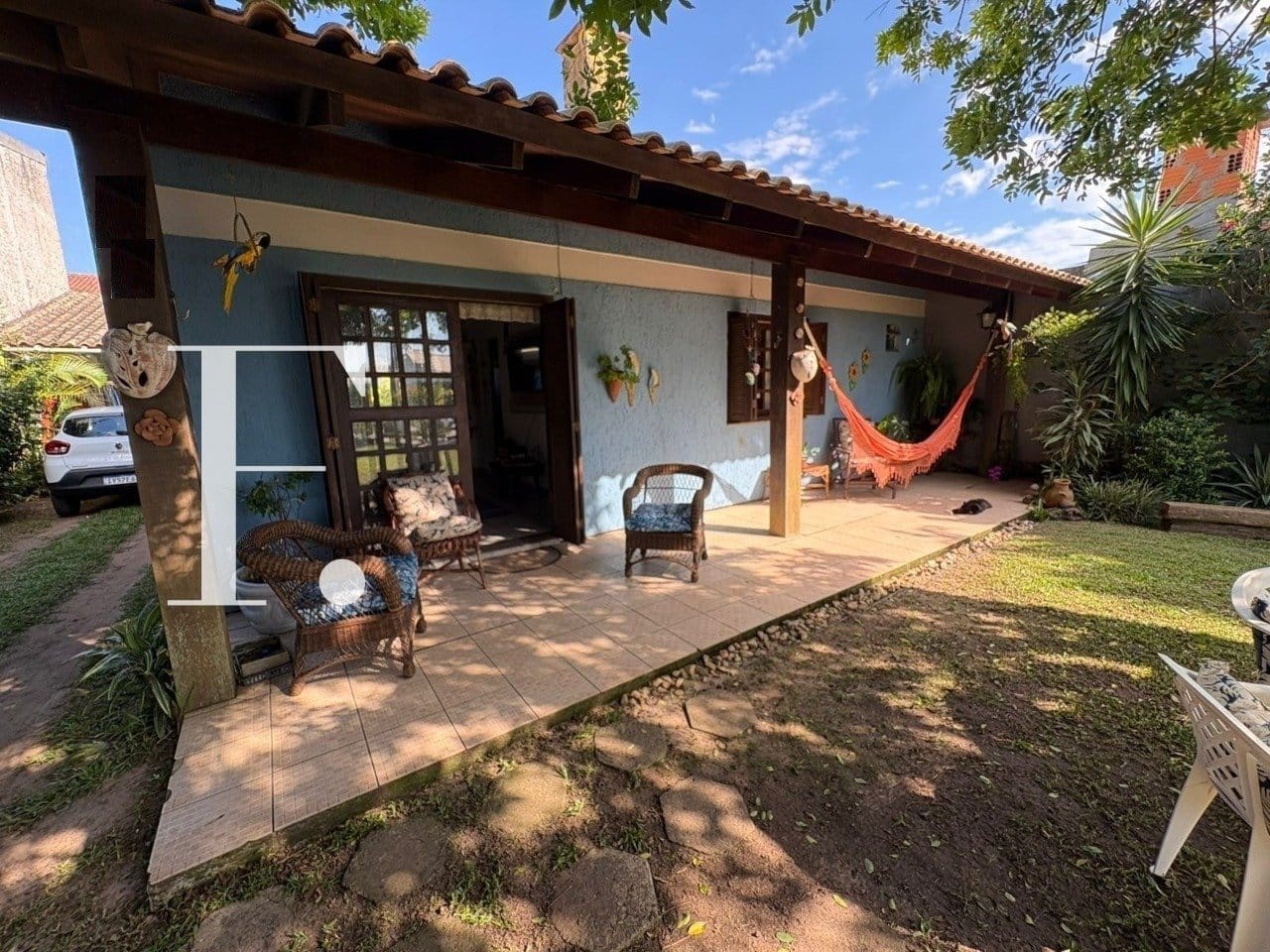 Casa com 98m², 2 dormitórios, 1 suíte, 2 vagas, no bairro Centro em Xangri-Lá