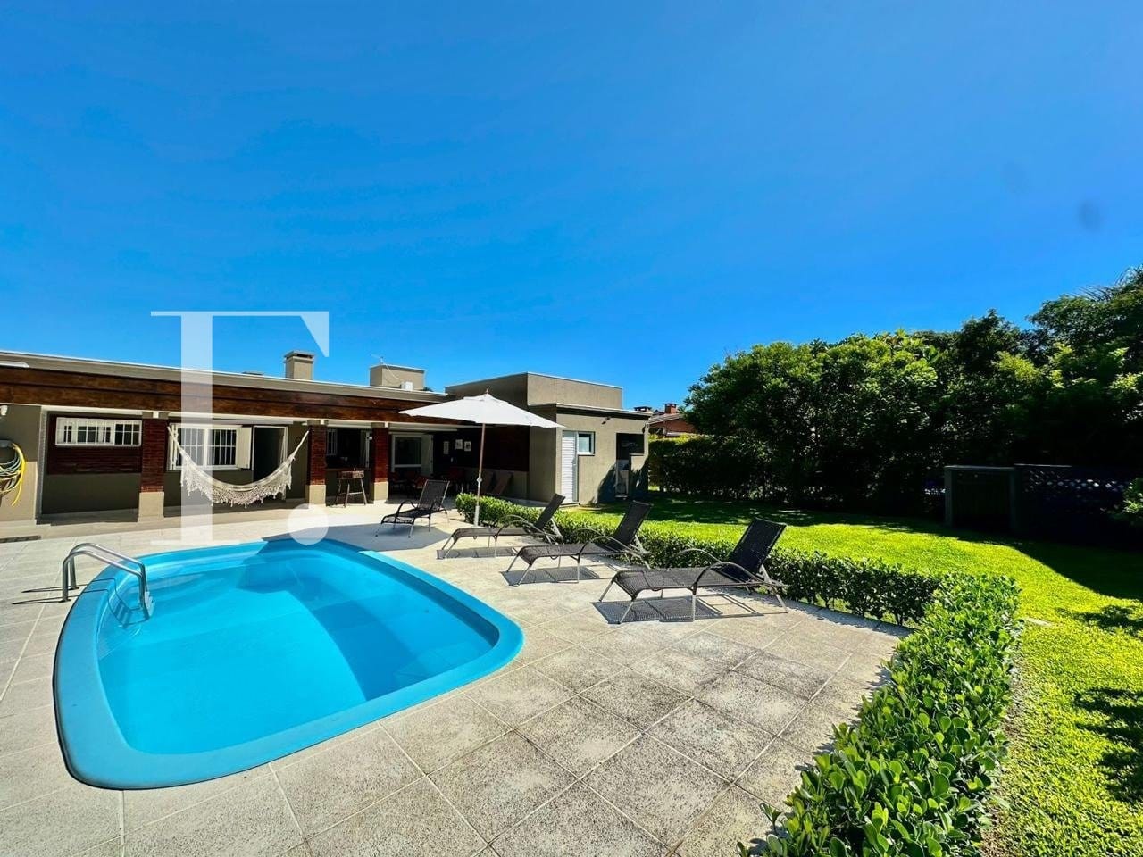 Casa com 183m², 5 dormitórios, 2 suítes, 2 vagas, no bairro Atlântida em Xangri-Lá