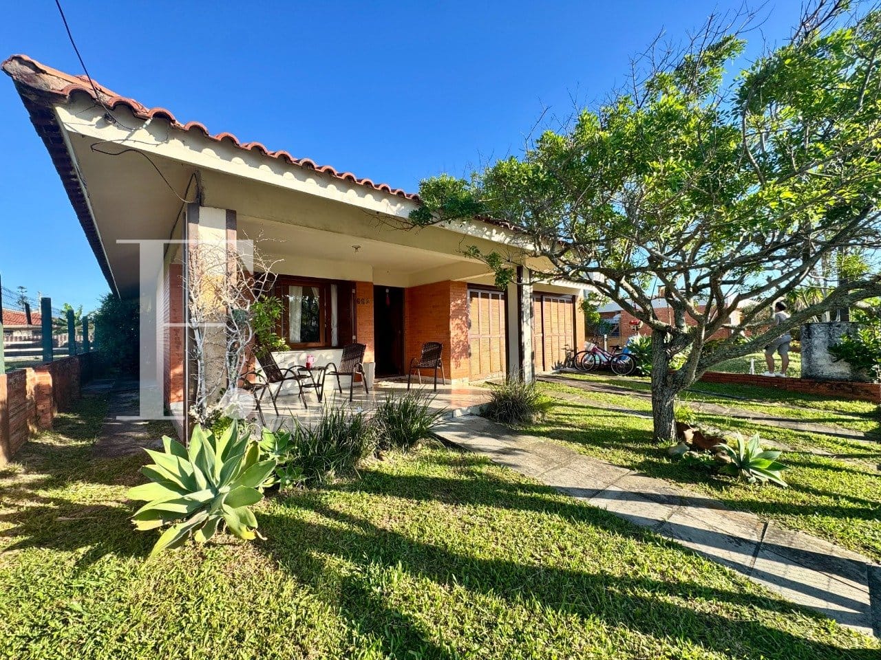 Casa com 180m², 3 dormitórios, 1 suíte, 4 vagas, no bairro Centro em Xangri-Lá