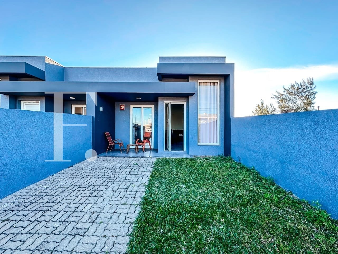 Casa com 100m², 3 dormitórios, 1 suíte, 2 vagas, no bairro Centro em Xangri-Lá