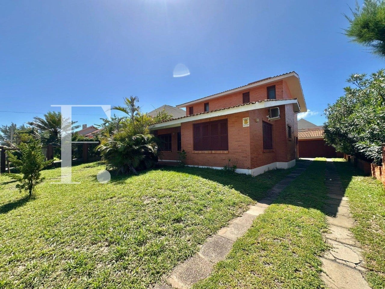 Casa com 227m², 4 dormitórios, 2 suítes, 2 vagas, no bairro Atlântida em Xangri-Lá