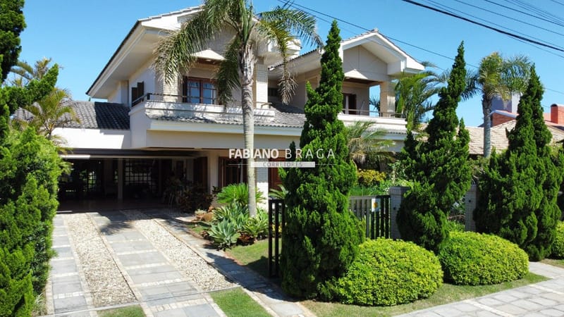 Casa com 352m², 4 dormitórios, 2 suítes, 2 vagas, no bairro Atlântida em Xangri-Lá
