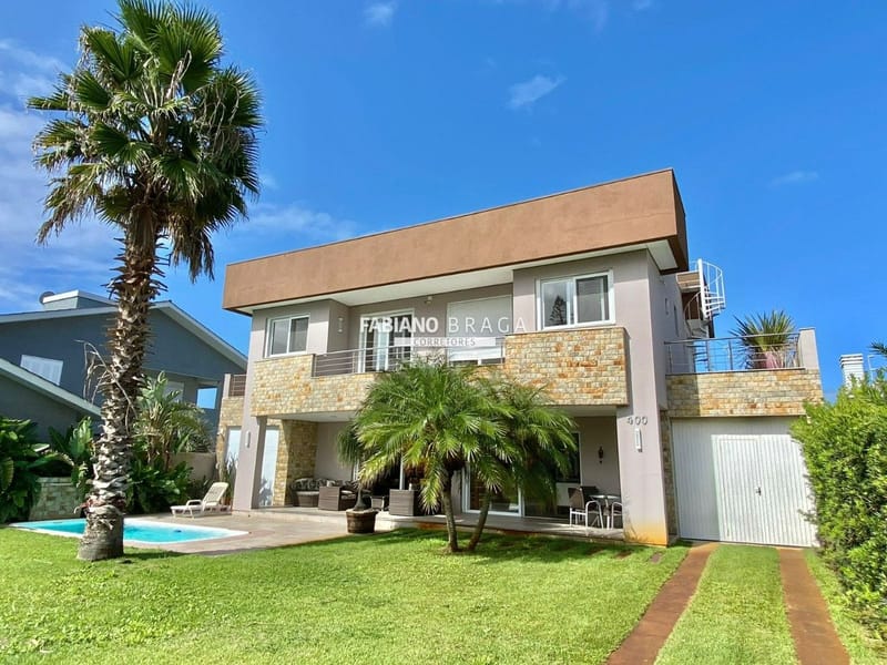 Casa com 346m², 4 dormitórios, 1 suíte, 2 vagas, no bairro Atlântida em Xangri-Lá