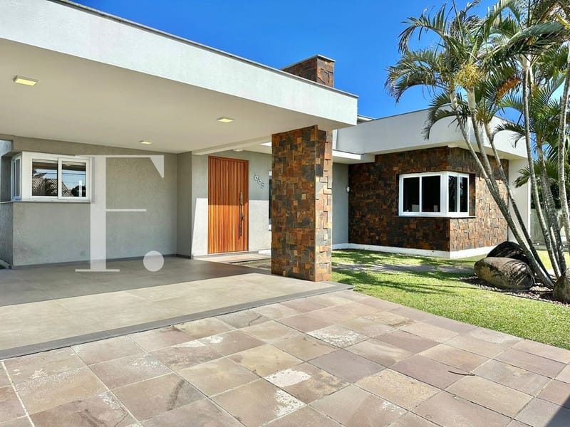 Casa com 260m², 4 dormitórios, 4 suítes, 2 vagas, no bairro Atlântida em Xangri-Lá