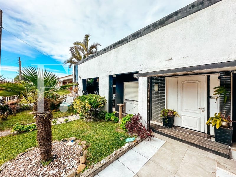 Casa com 265m², 4 dormitórios, 2 vagas, no bairro Centro em Xangri-Lá