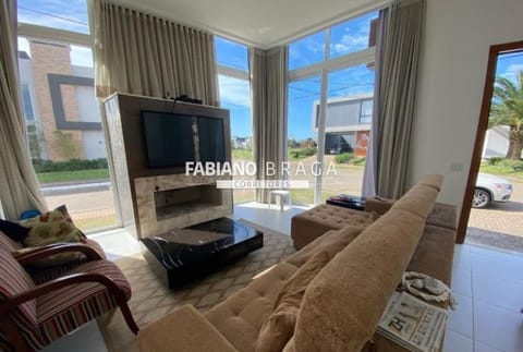 Casa Condomínio com 218m², 4 dormitórios, 4 suítes, 3 vagas, Sea Coast em Xangri-Lá