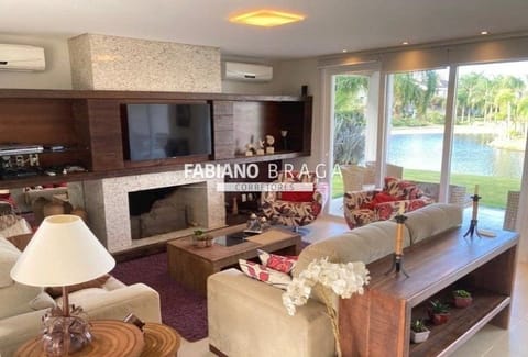 Sobrado com 321m², 4 dormitórios, 4 suítes, 4 vagas, Porto Coronado em Xangri-Lá