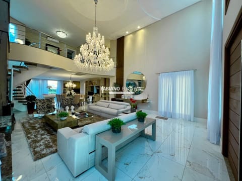 Sobrado com 380m², 4 dormitórios, 4 suítes, 4 vagas, Enseada Lagos em Xangri-Lá