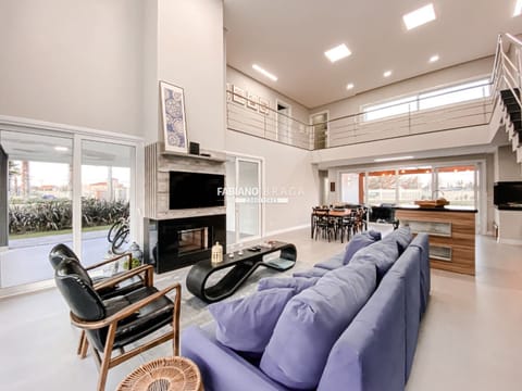 Sobrado com 267m², 4 dormitórios, 4 suítes, 2 vagas, Celebration em Xangri-Lá