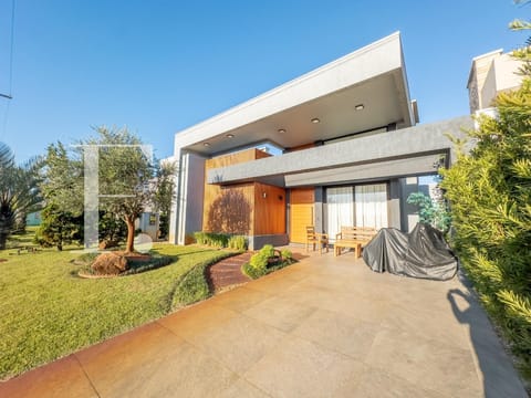 Casa Condomínio com 172m², 4 dormitórios, 4 suítes, 2 vagas, Riviera em Xangri-Lá