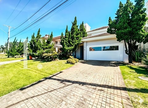 Sobrado com 338m², 4 dormitórios, 4 suítes, 2 vagas, Bosques de Atlântida em Xangri-Lá