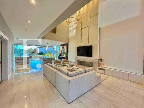 Sobrado com 350m², 4 dormitórios, 4 suítes, 2 vagas, Capão Ilhas Resort em Capão da Canoa