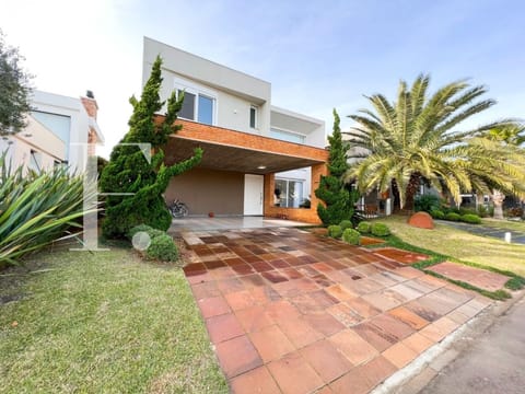Sobrado com 289m², 5 dormitórios, 5 suítes, 3 vagas, Malibu em Xangri-Lá