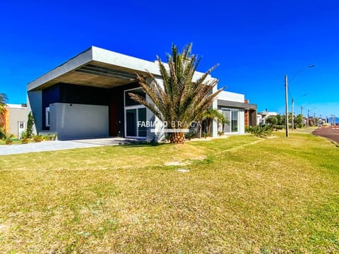 Casa Condomínio com 207m², 4 dormitórios, 4 suítes, 2 vagas, Riviera em Xangri-Lá