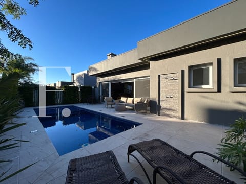 Casa Condomínio com 202m², 3 dormitórios, 3 suítes, 4 vagas, Enseada Lagos em Xangri-Lá