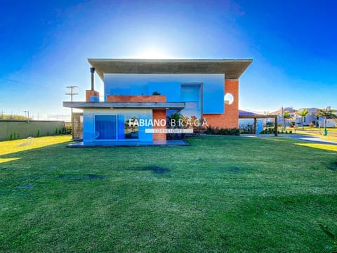 Sobrado com 234m², 3 dormitórios, 3 suítes, 2 vagas, Green Village Golf Club em Xangri-Lá
