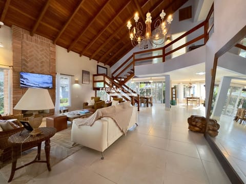 Sobrado com 281m², 4 dormitórios, 4 suítes, Carmel em Xangri-Lá