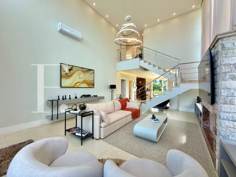 Sobrado com 267m², 4 dormitórios, 4 suítes, 2 vagas, Capão Ilhas Resort em Capão da Canoa