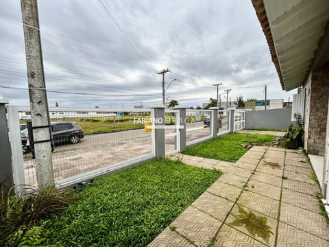 Casa com 220m², 4 dormitórios, 2 suítes, 1 vaga, no bairro Centro em Xangri-Lá