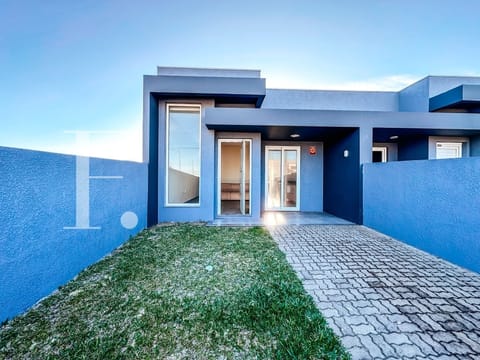 Casa com 100m², 3 dormitórios, 1 suíte, 2 vagas, no bairro Centro em Xangri-Lá