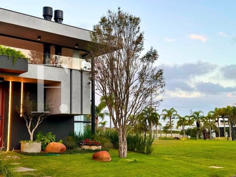Casa Condomínio com 312m², 4 dormitórios, 4 suítes, 2 vagas, Capão Ilhas Resort em Capão da Canoa
