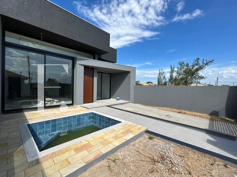 Casa com 124m², 3 dormitórios, 1 suíte, 1 vaga, no bairro Noiva do Mar em Xangri-Lá