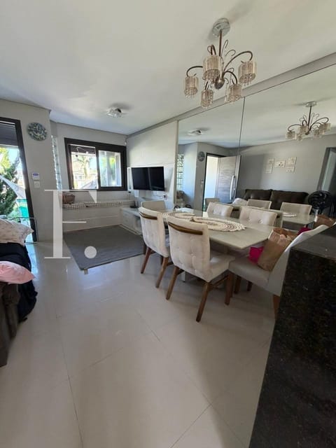 Casa com 105m², 2 dormitórios, 1 suíte, 1 vaga, no bairro Arpoador em Xangri-Lá