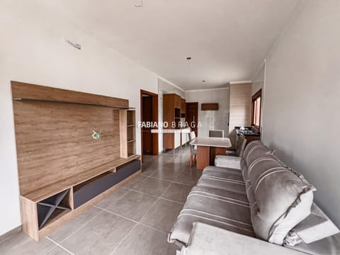 Casa com 65m², 2 dormitórios, 1 suíte, 2 vagas, no bairro Rainha do Mar em Xangri-Lá