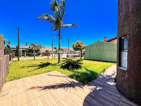 Casa com 142m², 3 dormitórios, 2 vagas, no bairro Rainha do Mar em Xangri-Lá