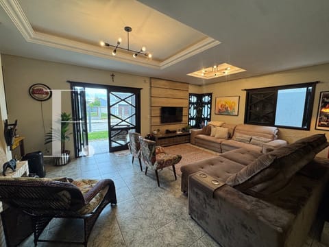 Casa com 183m², 4 dormitórios, 1 suíte, 2 vagas, no bairro Noiva do Mar em Xangri-Lá