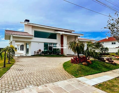 Casa Condomínio com 508m², 7 dormitórios, 7 suítes, 2 vagas, Green Village Golf Club em Xangri-Lá