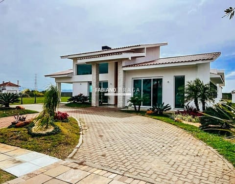 Casa Condomínio com 508m², 7 dormitórios, 7 suítes, 2 vagas, Green Village Golf Club em Xangri-Lá