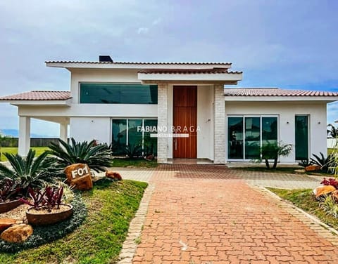 Casa Condomínio com 508m², 7 dormitórios, 7 suítes, 2 vagas, Green Village Golf Club em Xangri-Lá