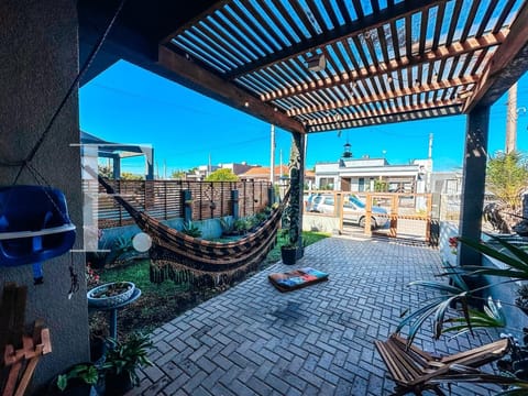 Casa com 74m², 2 dormitórios, 1 suíte, 1 vaga, no bairro Rainha do Mar em Xangri-Lá