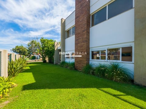 Casa com 225m², 4 dormitórios, 4 suítes, 2 vagas, no bairro Atlântida em Xangri-Lá