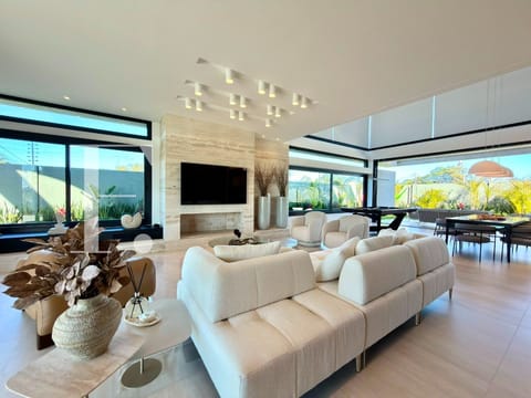 Sobrado com 410m², 5 dormitórios, 5 suítes, 2 vagas, Lótus em Xangri-Lá