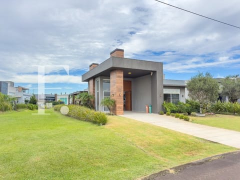 Casa Condomínio com 180m², 3 dormitórios, 3 suítes, 2 vagas, Riviera em Xangri-Lá