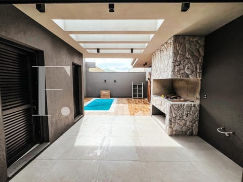 Casa com 177m², 4 dormitórios, 4 suítes, 2 vagas, no bairro Rainha do Mar em Xangri-Lá