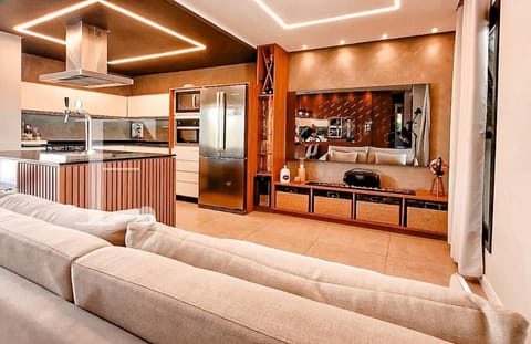 Casa com 122m², 3 dormitórios, 1 suíte, 2 vagas, no bairro Rainha do Mar em Xangri-Lá