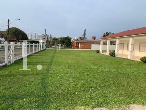 Casa com 380m², 4 dormitórios, 2 suítes, 2 vagas, no bairro Atlântida em Xangri-Lá
