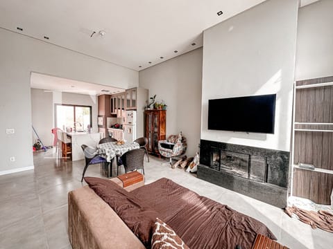 Casa com 120m², 3 dormitórios, 3 suítes, 2 vagas, no bairro Noiva do Mar em Xangri-Lá