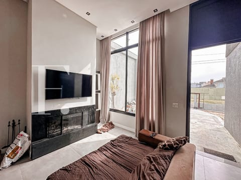 Casa com 120m², 3 dormitórios, 3 suítes, 2 vagas, no bairro Noiva do Mar em Xangri-Lá