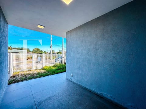 Casa com 90m², 2 dormitórios, 1 suíte, 2 vagas, no bairro Noiva do Mar em Xangri-Lá