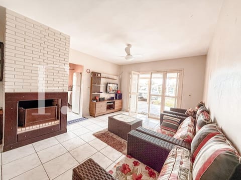 Casa com 120m², 3 dormitórios, 3 suítes, 2 vagas, no bairro Noiva do Mar em Xangri-Lá