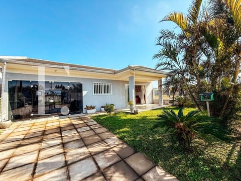 Casa com 120m², 2 dormitórios, 1 suíte, 2 vagas, no bairro Noiva do Mar em Xangri-Lá